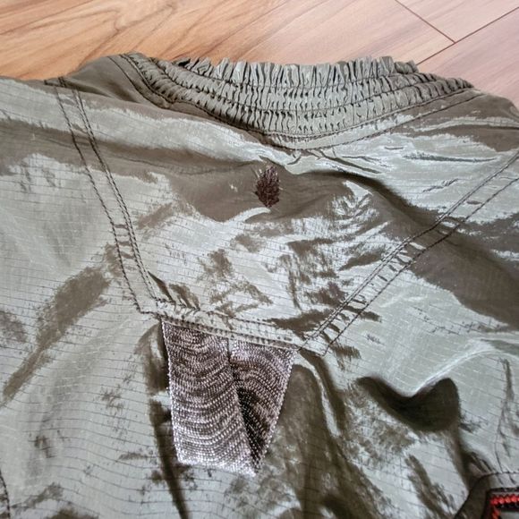 🆕 Free People Movement Starting Lineup Ruffle Smocked Windbreaker in Olive - Picture 13 of 14